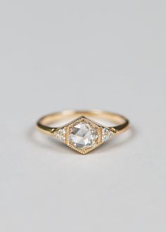 a gold and white diamond ring