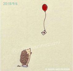 a hedge holding a red balloon in the air with it's tail sticking out