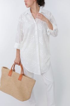 Experience true luxury with our Queen Anne Embroidery Tunic Shirt – a masterpiece crafted from fine Italian 100% cotton. This regal, long-length garment showcases a delicate Queen Anne Lace flower, inviting the essence of all seasons. Immerse yourself in the sumptuous feel of Italian craftsmanship, where elegance meets comfort in every stitch.The ensemble includes a separate off-white tank, crafted from 100% Viscose with a touch of stretch, meticulously chosen for its luxurious feel and perfect Queen Anne Lace Flower, Anne Lace Flower, Queen Anne Lace, Queen Anne's Lace Flowers, Layered Tunic, Queen Annes Lace, Italian Craftsmanship, Layering Tanks, Lace Flower