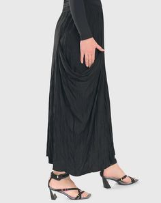 This versatile, ankle-skimming beauty will elevate your wardrobe options as a reliable go-to for any occasion. Delicious crinkle crepe in an effortless pull-on silhouette with Hagar's signature draped pocket on the side. All-around stretch waist, straight hem. Missy & Plus sizes Katya is 5'9" & wears Alembika 1 Spring Draped Bottoms With Folds, Chic Draped Bottoms With Folds, Chic Long Skirt With Folds, Chic Draped Gathered Skirt, Ruched Draped Flowy Skirt, Draped Flowy Ruched Bottoms, Chic Stretch Bottoms With Folds, Voluminous Long Ruched Skirt, Fashion For Over 50