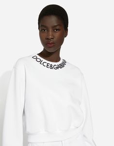 Cropped jersey sweatshirt with logo embroidery on neck: White Round neck Long sleeves Cropped fit Jersey trims The piece measures 49 cm from the rear collar seam on a size IT 40 The model is 175 cm tall and wears a size IT 40 Made in Italy Fall Crew Neck Top With Logo Detail, Crew Neck Tops With Logo Detail For Fall, White Tops With Logo For Fall, White Tops With Logo Detail For Fall, Fall Crew Neck Tops With Logo, White Crew Neck Top With Ribbed Collar, Relaxed Fit Crew Top With Embroidered Logo, White Sweatshirt With Ribbed Crew Neck, White Crew Neck Sweatshirt With Ribbed Neckline