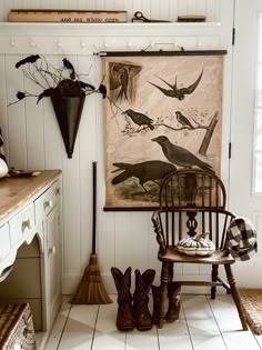 a room filled with furniture and decor on top of tiled flooring next to a painting