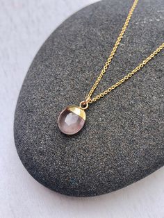 Rose Quartz Necklace, Rose Quartz Oval Pendant, Blush Pink Gold Necklace, Neutral Minimalist Layering Jewelry, Pink Jewelry Gift for women This simple dainty necklace features a tiny genuine rose quartz oval pendant dipped in your choice of 14k Gold Filled or Sterling Silver. The blush pink pendant is suspended from a delicate chain in the finish of your choice. This is a 100% rose quartz gemstone, full of healing properties. This necklace is simply perfect for everyday wear and is perfect for l Feminine Rose Gold Rose Quartz Necklaces, Minimalist Pink Necklaces, Minimalist Pink Round Necklaces, Pink Oval Feminine Jewelry, Feminine Oval Pink Jewelry, Feminine Pink Oval Jewelry, Feminine Rose Gold Necklace For Everyday, Feminine Blush Jewelry For Gift, Feminine Blush Jewelry Gift