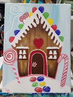 a painting of a gingerbread house with candy canes and lollipops