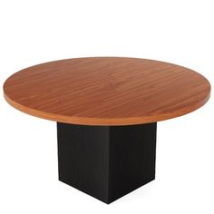 a round wooden table with black base