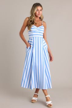 Embrace your inner coastal cutie with our light blue stripe midi dress! Made with soft, breezy fabric, this dress features a stylish striped design and a trendy midi length. Perfect for a day or night out, this dress will have you looking and feeling effortlessly chic. This blue stripe midi dress features a sweetheart neckline, thin adjustable straps, a fully smocked back, functional hip pockets, and a unique striped pattern.  100% Cotton Lined 100% Polyester Hand Wash Cold Manufactured in China Designed in the USA Model is wearing a size small Stripe Midi Dress, Sorority Rush Dresses, Halter Bridesmaid Dress, Summer Holiday Outfits, Rush Dresses, Dress Bra, Striped Midi Dress, Black Dresses Casual, Little White Dresses