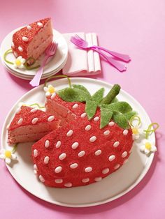 there is a strawberry cake on the plate and another piece has been cut into it