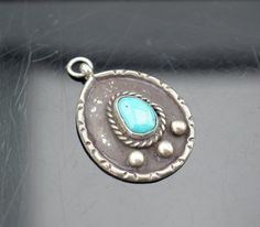 This is the perfect option for those who like cool, unique jewelry, and the luxury, shine of silver, turquoise. This pendant is well made, cute and/or elegant in design, and very desirable. The pendant is a charming sterling silver pendant with an image that looks like a paw. ♥ Age/Era: Circa before the 2000s. ♥ There is no hallmark, but it is sterling silver 925, tested with acid. ♥ The pendant is about 1 1/4'' x1''. I can assume that this pendant made by American Indians. Everyone interested i Victorian Turquoise Pendant Jewelry, Turquoise Nickel-free Oval Pendant Jewelry, Paw Art, Vintage Sterling Silver Turquoise Necklace Nickel-free, Vintage Sterling Silver Turquoise Necklace, Nickel-free, Art Deco Jewelry Vintage, Southwestern Turquoise Nickel-free Jewelry, Art Deco Pendant, Vintage Jewelry Art