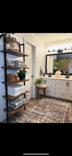 the bathroom is clean and ready to be used as a storage area for linens