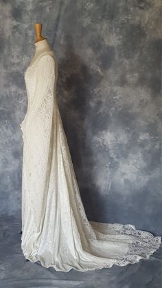 Medieval Style White Wedding Dress, Long Lace Wedding Gown, Wedding Medieval Dress With Fitted Bodice, Elegant White Medieval Wedding Dress, Fitted White Medieval Dress For Wedding, Floor-length Delicate Lace Wedding Dress, Vintage Floor-length Medieval Wedding Dress, Vintage Medieval Wedding Dress With Fitted Bodice, Vintage Medieval Dress For Wedding With Fitted Bodice