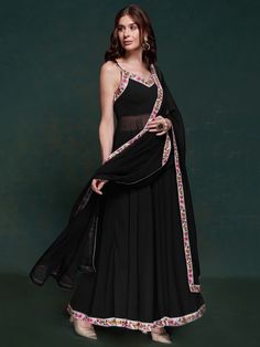 Make a bold and elegant statement with our black georgette party wear long suit with designer lace work. This sophisticated ensemble is crafted to bring out the best in your festive and party looks, combining the timeless elegance of black with exquisite design elements. Perfect for festivals, functions, and special events, this suit ensures you stand out with grace and style.
The luxurious black georgette fabric gives the suit a rich and elegant feel, while the detailed designer lace work adds Evening Party Wear Georgette Palazzo Set, Festive Evening Sharara Maxi Length, Black Semi-stitched Palazzo Set With Mirror Work, Evening Palazzo Set With Sheer Dupatta, Evening Salwar Kameez With Dupatta Floor-length, Floor-length Evening Salwar Kameez With Dupatta, Evening Floor-length Salwar Kameez With Dupatta, Georgette Palazzo Set With Dupatta For Evening, Evening Georgette Palazzo Set With Dupatta