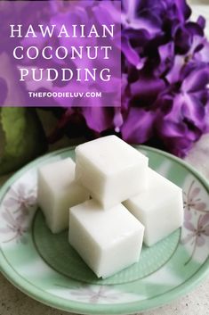 three cubes of coconut pudding on a plate with purple flowers in the background and text overlay that reads hawaiian coconut pudding