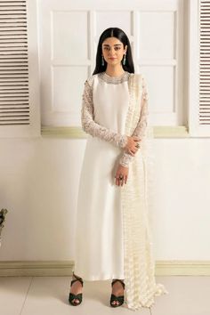 White Embroidered Pakistani Salwar Kameez with Dupatta is an elegant festive attire beautifully adorned with hand-worked details of threads and motifs. Reception Sherwani With Zari Work In Georgette, Bollywood Style Semi-stitched Georgette Sherwani, Semi-stitched Georgette Sherwani For Reception, Festive Semi-stitched Georgette Sherwani, Semi-stitched Salwar Kameez With Dupatta For Reception, Semi-stitched Chinon Kurta For Reception, Elegant Dola Silk Kurta For Reception, Reception Sherwani With Dupatta In Georgette, Georgette Sherwani With Dupatta For Reception