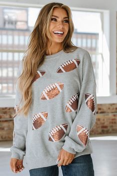 Show off your team spirit with our KC Football Graphic Sweatshirt! Made with comfort and style in mind, you'll feel confident and cozy while cheering on your favorite team. The bold graphic design will make a statement and show everyone who you're rooting for. Perfect for game days and everyday wear. Go team! Model Info: Models are 5'7", Size 2, wearing smalls Material: 65% Cotton + 35% Polyester Sizes Bust Hem_Width Shoulder Sleeve_Length Length Relax Relax Relax Relax Back S 49.6 37.8 28.0 19. Lakers Team, Kc Football, Bold Graphic Design, Hockey Clothes, Soccer Outfits, Cheer Outfits, Go Team, Football Sweatshirt, Football Outfits