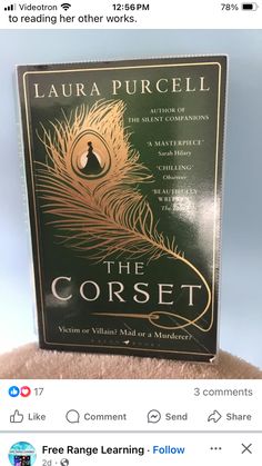 a book with an image of a peacock feather on it's cover and the words, the corset written in gold