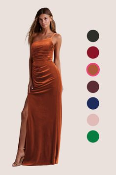 a woman in a long dress with different colors