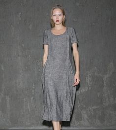 A cool linen dress is an absolute must-have in any woman's wardrobe. The loose-fitting style of this gray dress will give you not only comfort but also a fabulous silhouette no matter what size you are. Whether you decide to wear this dress for lounging around the house or at the office, you'll know that you'll be able to keep cool. Anyone who has experienced the coolness of wearing cool linen fabric would never want to not own linen clothing. This is especially true when it comes to women's dre Gray Fitted Short Sleeve Maxi Dress, Casual Sheath Midi Dress, Fitted Gray Casual Dress, Gray Shift Dresses, Gray Midi-length Summer Dresses, Short Sleeve Gray Dress For Spring, Gray Shift Dresses For Summer, Gray Short Sleeve Dress For Spring, Gray Knee-length Midi Dress For Summer