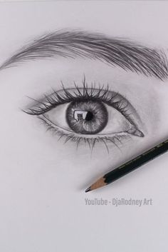 a pencil drawing of an eye with the letter f in it's irise