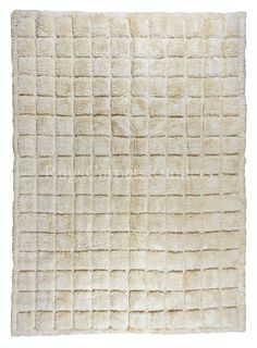 a white rug with squares on it