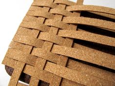 a piece of cardboard that is made to look like a basket weave