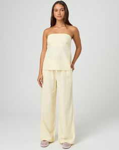 These tie waist pants feature a relaxed leg style and a mid rise fit. Chic Straight Leg Bottoms With Tie Waist, Chic Tie Waist Ankle-length Pants, Chic Ankle-length Tie Waist Pants, Chic Straight Pants With Tie Waist, Versatile Wide-leg Pants With Tie Waist, Versatile Straight Pants With Tie Waist, Chic Tie Waist Loungewear Bottoms, Chic Tie Waist Bottoms For Loungewear, Chic Relaxed Fit Bottoms With Tie Waist