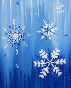 three snowflakes are shown in blue and white on an acrylic background