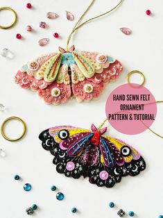 a butterfly ornament hanging from a string with beads around it and the words hand sewn felt ornament pattern & video below