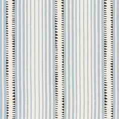 a blue and white striped wallpaper with small black lines on the bottom half of it