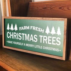 a wooden sign that says farm fresh christmas trees have yourself a merry little christmas