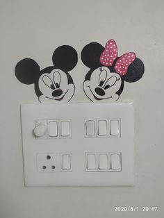 two mickey and minnie mouse light switch plates