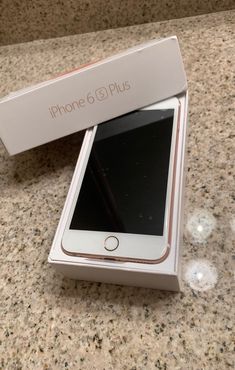 an iphone 6 plus in its box on the counter