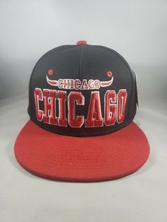 New Chicago Bulls Hat NBA Basketball Snapback Adjustable. Black cap with red bill.  Embroidered front.  Beautiful style Hip Hop Snapback Hat With Letter Print, Hip Hop Snapback Hat With Letter Print Visor, Casual Red Fitted Hat For Streetwear, Red Snapback Fitted Hat, Casual Red Snapback Hat With Flat Bill, Red Snapback Casual Fitted Hat, Red Casual Snapback Hat For Sports, Casual Red Snapback Hat For Sports, Red Casual Snapback Fitted Hat