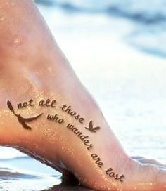 a person's foot with tattoos on it and the words, beautiful bohemian tattoo design ideas