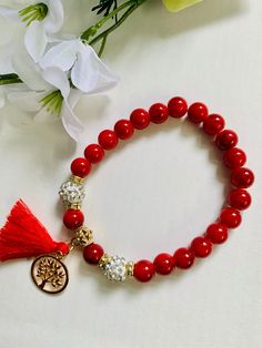 Beautiful handmade red glass bead bracelet with golden tassel charm with stretchable cord . size : fit for 7" to 8.5" inch wrist 1 piece  Color option Available Ready to ship with eco friendly packaging. Cheap Handmade Red Charm Bracelet, Red Beaded Bracelets For Meditation 8mm, Red Bracelets With 8mm Beads For Meditation, Red Meditation Bracelets With 8mm Beads, Red Gemstone Beads Bracelets For Meditation, Red Spiritual Beaded Bracelets As Gift, Spiritual Red Beaded Bracelets As Gift, Spiritual Red Beaded Bracelets For Gift, Red 8mm Beads Jewelry For Meditation