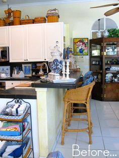 a kitchen filled with lots of furniture and decor