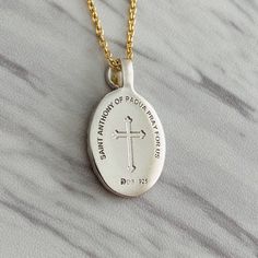 "St. Anthony of Padua is known among Christians as the Patron Saint of lost articles. It is believed that prayers to Saint Anthony give a spirit of hope and optimism to finding lost articles whether they be tangible or intangible. Premium Sterling Silver Chain Included: Includes our signature sterling silver 925 chain that is offered in 16\", 18\", 20\", or 24\". Pendant Length: 22 mm Pendant Width: 16 mm Free shipping available on all orders. Materials & Crafting: We are known for our quali St Anthony Of Padua, Anthony Of Padua, Saint Anthony Of Padua, St Anthony, Saint Anthony, Patron Saints, Wedding Necklace, Sterling Silver Chains, Gold Vermeil