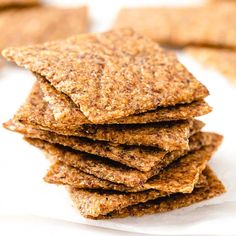 a stack of crackers sitting on top of a white plate