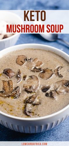 a white bowl filled with mushroom soup on top of a blue table