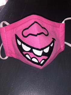 Fun, Princess Poppy Inspired Troll Face Mask. A Great accessories for our Queen Barb costume!!  Made with a high quality mask and face is iron on vinyl  Every little girl loves "TROLLS" and this is fun for dress up, Halloween or even for a birthday!!  SUPER FUN Perfect for all your upcoming parties. If you prefer a different color please message (convo) me through etsy and we will be happy to set you up a custom listing. Questions on our turn around time, please check out our homepage. Washing I Trolls Costume, Queen Barb, Dress Up Halloween, Troll Costume, Princess Poppy, Mask Pictures, Ugly Dolls, Mini Top Hat, Cute Face Mask