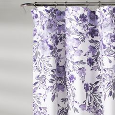 a shower curtain with purple flowers on it