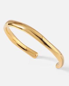 This bracelet features a classic bangle touched by the inspiration of life’s ups and downs, finished with a wavy shape that is concise and easy, encouraging people that - feel the changes and embrace them with no fear anymore. Classic silhouettes with wavy detailing give this ring versatility, ideal for stacking with other bracelets and jewelry in “The Wavy” collection or just worn solo.
 
Band Width: 6mm
Band Thickness: 2.5mm
Material: 18k Gold Plated On Brass Modern Twist Cuff Bangle For Everyday, Classic Bangles, No Fear, Ups And Downs, Cuff Bracelet, Gold Bracelet, 18k Gold, Gold Plate, Bangles