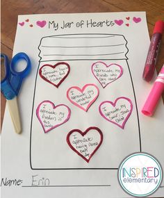 valentine's day jar of hearts craft with markers and crayons on the table