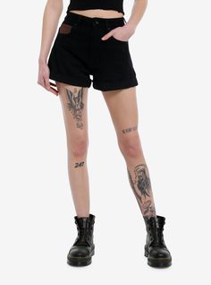 Bring the grungy witch look into summer in these black  high-rise mom shorts! Featuring brown contrast back pockets with skull sun and moon designs.Please note: Style is fitted with no stretch; size up for a looser fit.100% cottonWash cold; dry flatRise: 11''Inseam: 3''ImportedListed in junior sizesModel is 5'9''Model wears size 3 Emo Bottoms For Spring Streetwear, Punk Style Short Jean Shorts For Summer, Punk Style Cotton Shorts For Spring, Punk Style Cotton Jean Shorts, Punk High Waist Cotton Shorts, Punk Style High Waist Cotton Shorts, Trendy High-waist Shorts For Alternative Fashion, Trendy High Waist Shorts For Alternative Fashion, Punk High Waist Summer Shorts