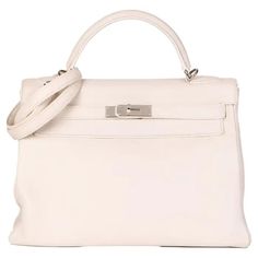 HERMÈS White Clemence Leather Kelly 32cm Retourne For Sale at 1stDibs | hermes kelly 32 price, kelly retourne, hermes retourne Hermes Kelly 32, Kelly 32, Hermes Bags, Bag Shoulder, Dust Bag, Shoulder Strap, Top Handle Bag, Purses And Bags, Handbags