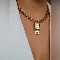 Be On Trend With This Oh So Stylish Louis Vuitton Lock And Key N- 310 Necklace. Necklace Chain Is 18" Gold Plated - Worn Gold Finish. Necklace Chain Is Brand New. Authentic Designer Lock And Key Are Repurposed. Slight Imperfections May Be Present But Do Not Detract From The Beauty Of The Finished Product. Louis Vuitton Lock Necklace, Louis Vuitton Necklace, Clear Necklace, Louis Vuitton Trunk, Gold Outfit, Trunk Bag, Louis Vuitton Jewelry, Costume Necklaces, Jewelry Sale