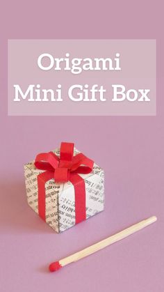 an origami mini gift box with matches on it and the title overlay reads, origami mini gift box