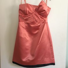 Buttery Satin Strapless Coral Dress By Bcbg. Hem Has A Black Contrasting Stripe, And The Top Has A Beautiful Statement Bow. Slightly Flared Fit, Very Flattering. Brand New, With Tags! Formal Strapless Sweetheart Neckline Dress, Summer Dinner Mini Dress With Lining, Summer Dinner Mini Dress Lined, Elegant Pink Lined Strapless Dress, Pink Formal Mini Dress With Spaghetti Straps, Coral Dress, Orange Red, Color Orange, A Black