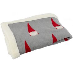 a gray and red blanket with gnomes on it's sides, sitting on top of a white floor