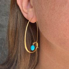 These 18k yellow gold large snake earrings from Gabriella Kiss are a Quadrum favorite! The elegant hoops feature tiny diamond eyes for a hint of fiery spark. Smooth turquoise drops hang from the serpents’ mouths, adding an element of allure to these already delightfully mysterious earrings. Hoops measure about 2” in length x 1 3/8” wide. Handcrafted in Hudson Valley, NY, U.S. Gabriella Kiss, Large Snake, Largest Snake, 1000 Gifts, Hudson Valley Ny, All Band, Earrings Hoops, Diamond Eyes, Snake Earrings