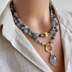 Add a touch of natural beauty to your look with this stunning Agate Necklace. Perfect for the free-spirited boho style woman, the unique piece of jewelery features an exclusive handmade design of gray beads and unique pendant that exudes a sense of sophistication and elegance. With its hand-crafted gemstone construction, this necklace is not only stylish, but also carries a personal touch that makes it the perfect Mother's Day gift for the special woman in your life. Stand out and elevate your s Gray Beaded Necklace, Boho Woman, Grey Beads, Mineral Stone, Agate Necklace, Necklace Boho, Unique Pendant, Free Spirited, Boho Stil